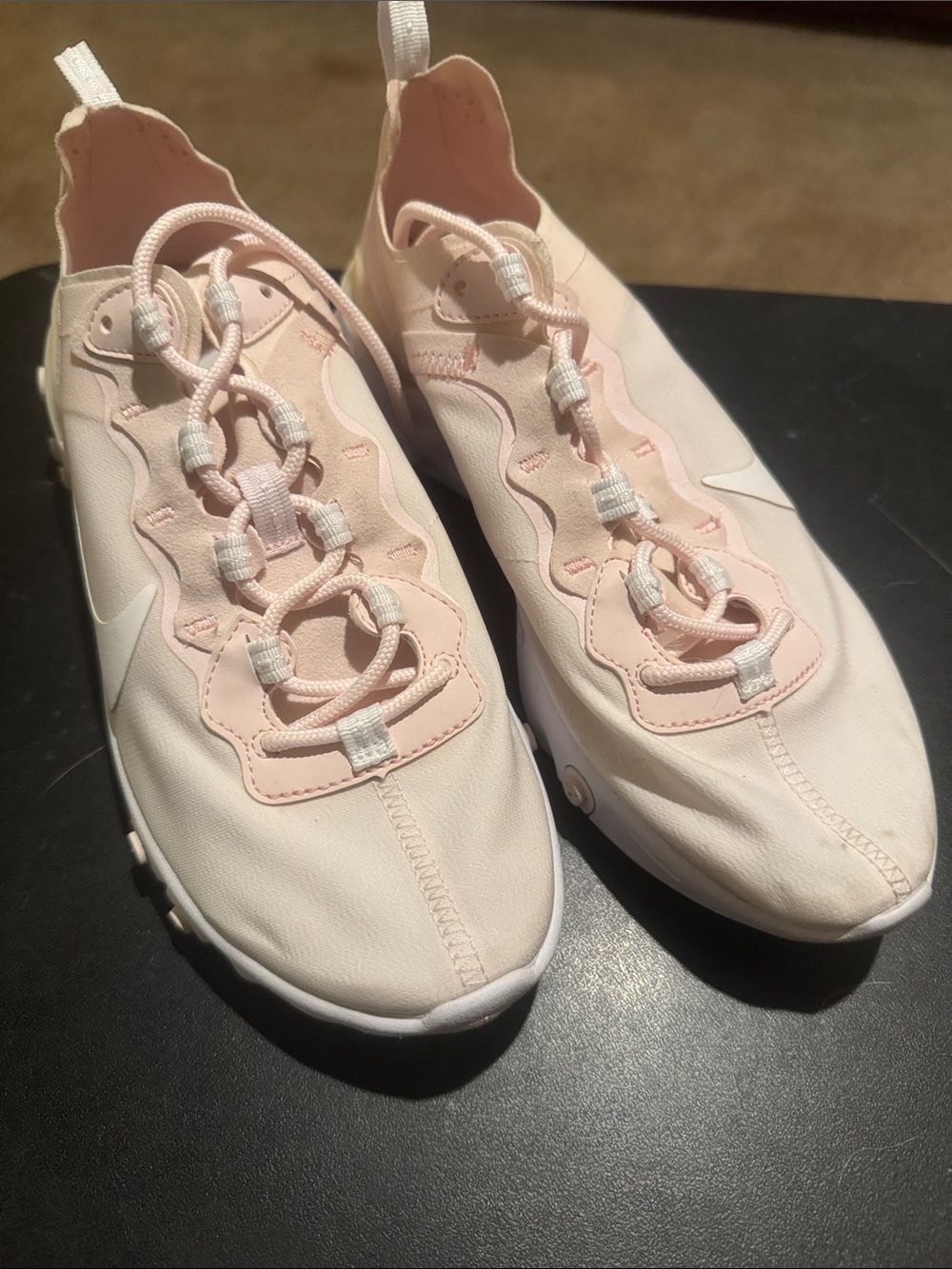 Nike Women’s Pale Pink Slip-On Sneakers